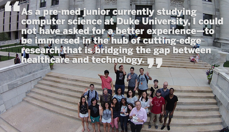 2015 Summer Institute cohort on steps of Gordon Hall being filmed from Zak Kohane's drone